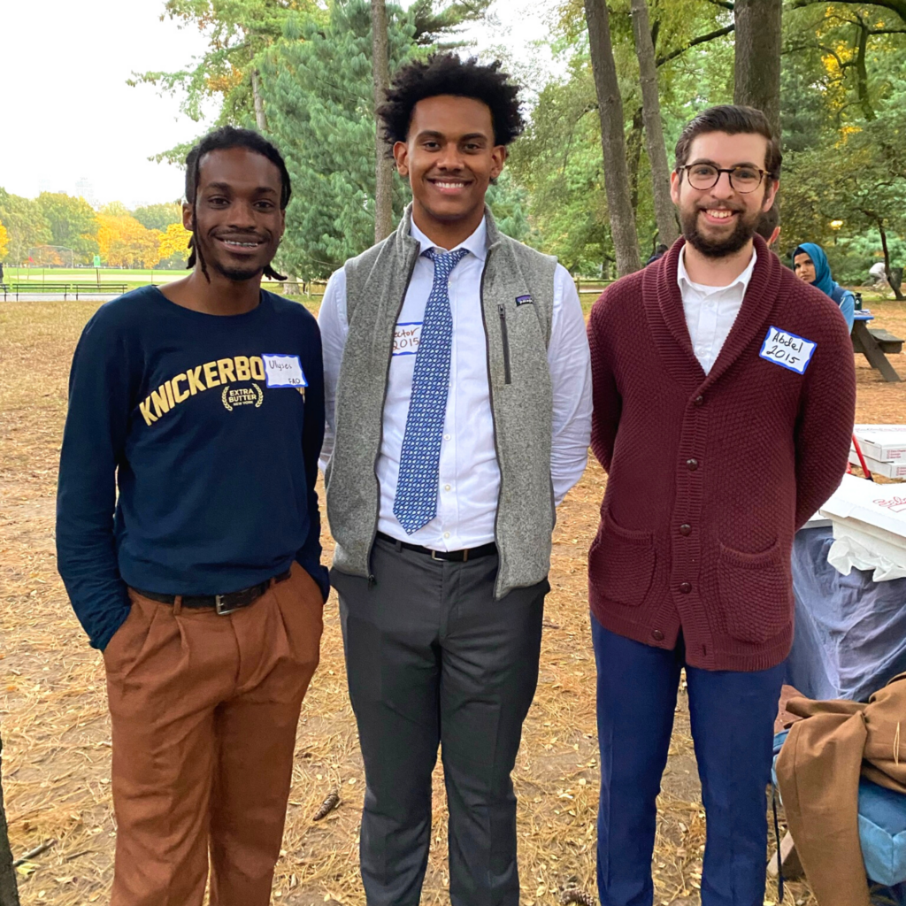 Staff and alumni attend an event