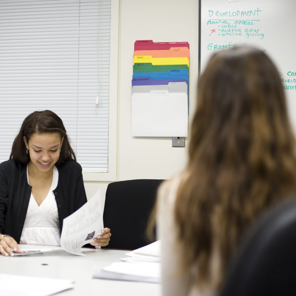 A student reviews some papers