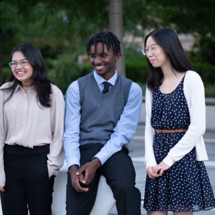 Students smiling together. 